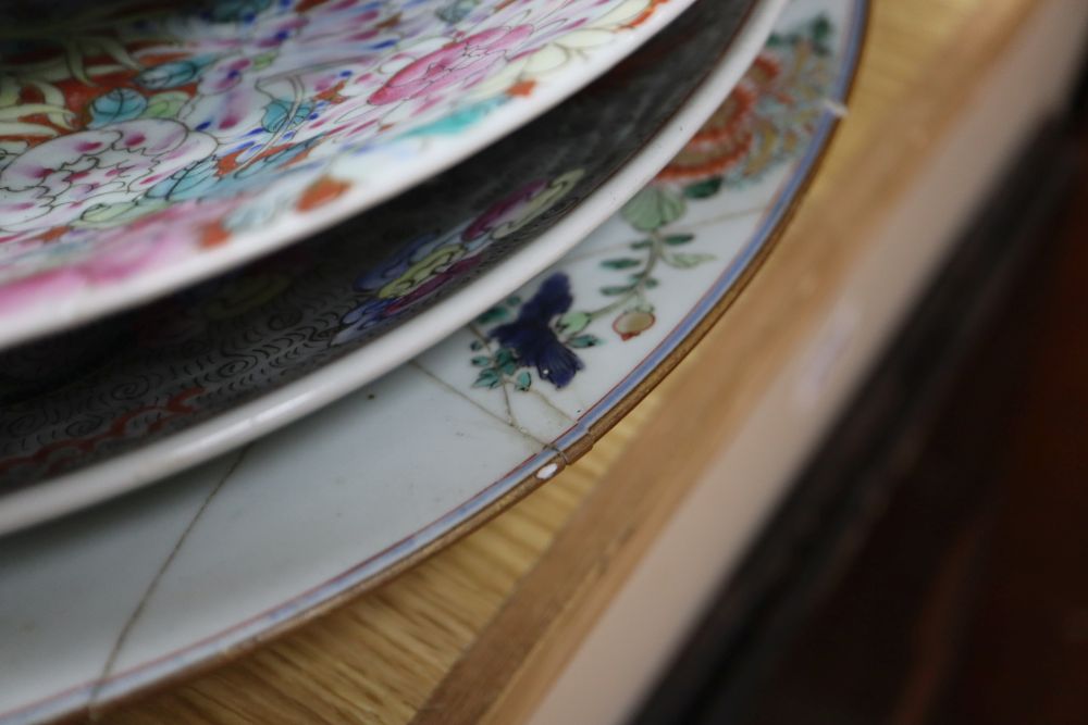 A collection of Oriental chargers and plates,